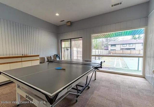 a workspace with furniture window and outside view