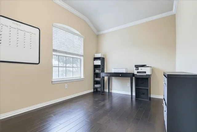 a view of a livingroom with furniture and wooden floor