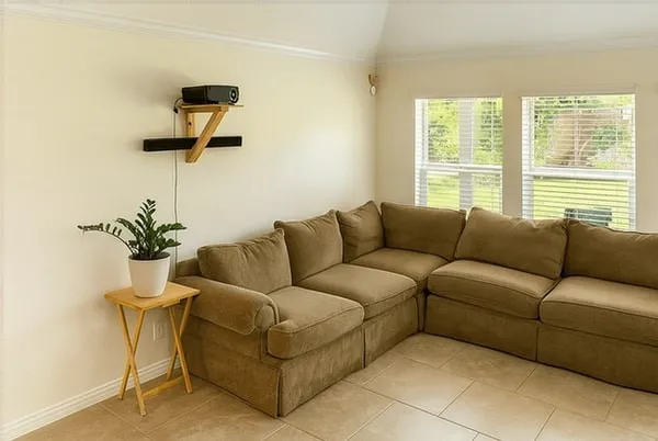 a living room with furniture and a window