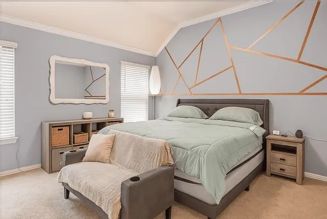 a bedroom with a bed and a cabinets