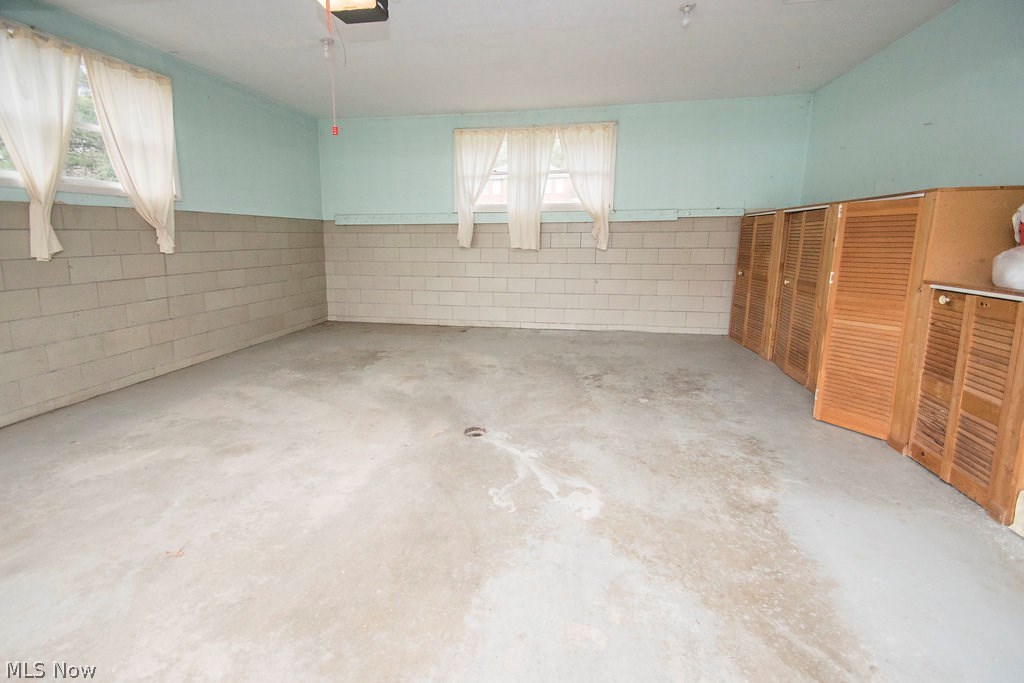 1877 Spring Valley Avenue Northwest Canton, OH 44708 - Photo 23 of 24 Well kept garage space with storage.