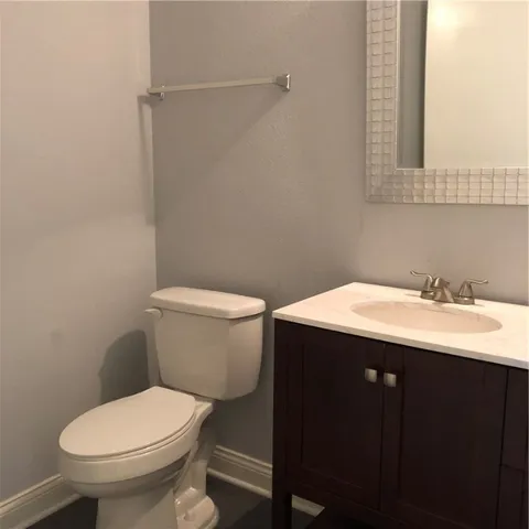 a bathroom with a sink and a toilet
