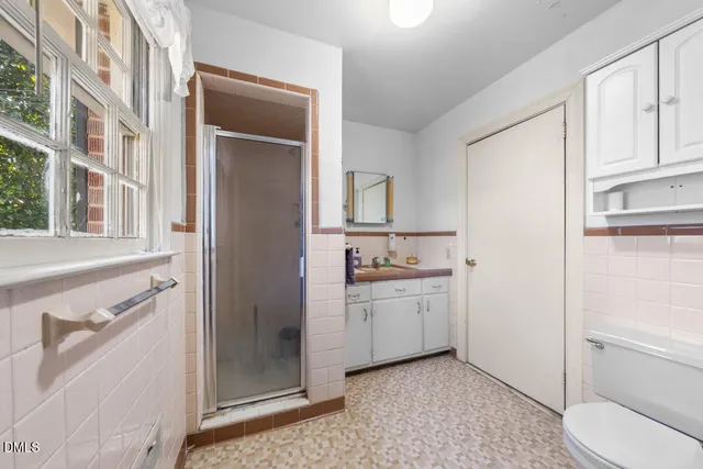 a bathroom with a sink toilet and vanity