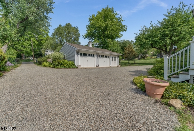 11 New Street Mendham, NJ 07945 - Photo 29 of 35 a front view of a house with garden