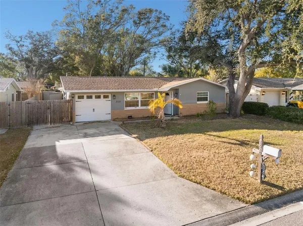 front view of a house with a yard