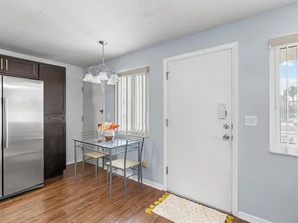 a room that has a table and a chair in it