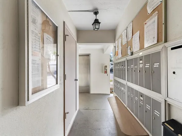 a room with furniture and a large window