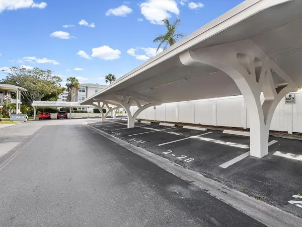 a view of a livingroom with kitchen