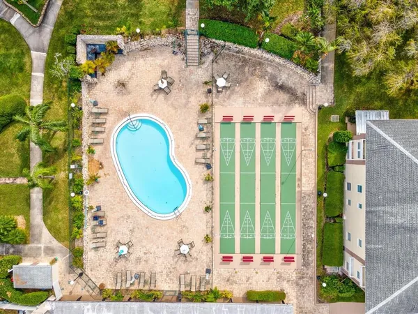 an aerial view of a house with swimming pool