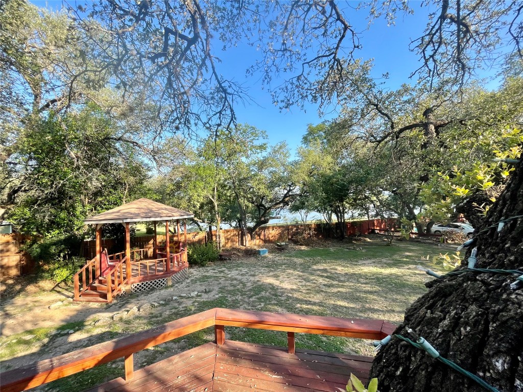 17357 West Beach Road Austin, TX 78734 - Photo 19 of 32 a view of a swimming pool with a patio