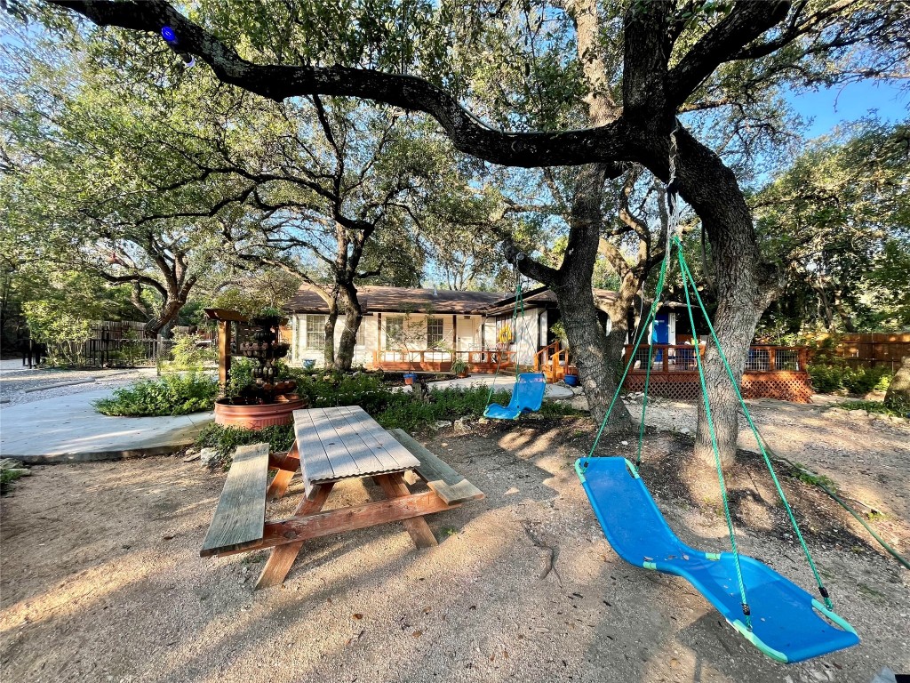 17357 West Beach Road Austin, TX 78734 - Photo 20 of 32 a view of a park with iron fence