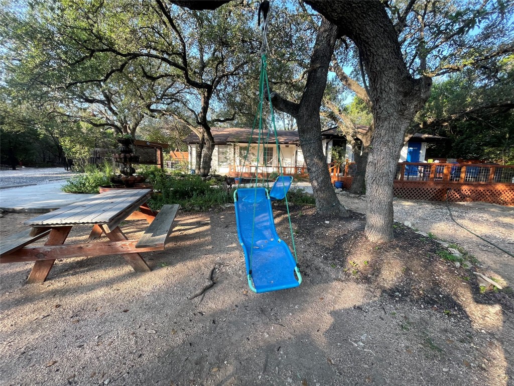 17357 West Beach Road Austin, TX 78734 - Photo 21 of 32 a view of a park with large trees