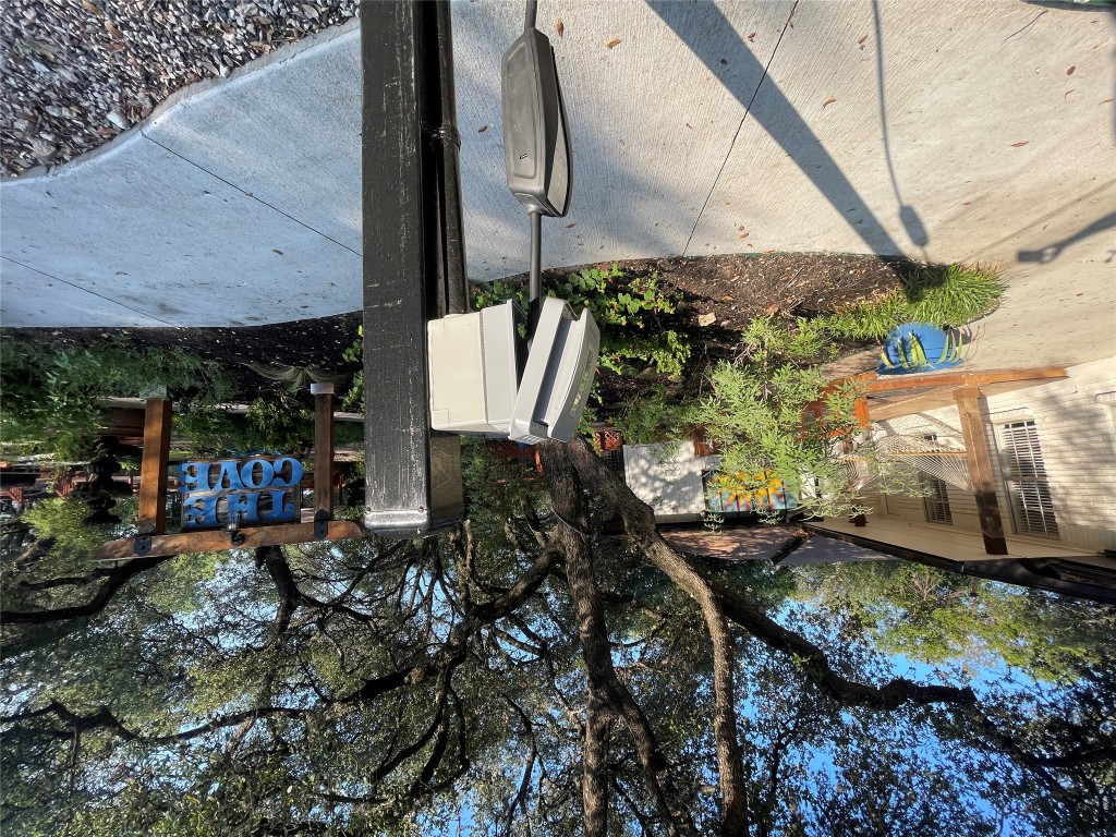 17357 West Beach Road Austin, TX 78734 - Photo 23 of 32 a street view with tall buildings