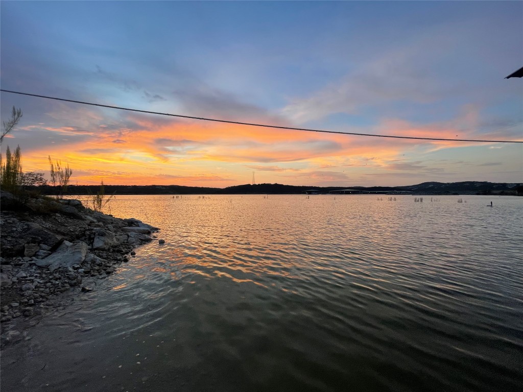 17357 West Beach Road Austin, TX 78734 - Photo 27 of 32 a view of an ocean from a balcony
