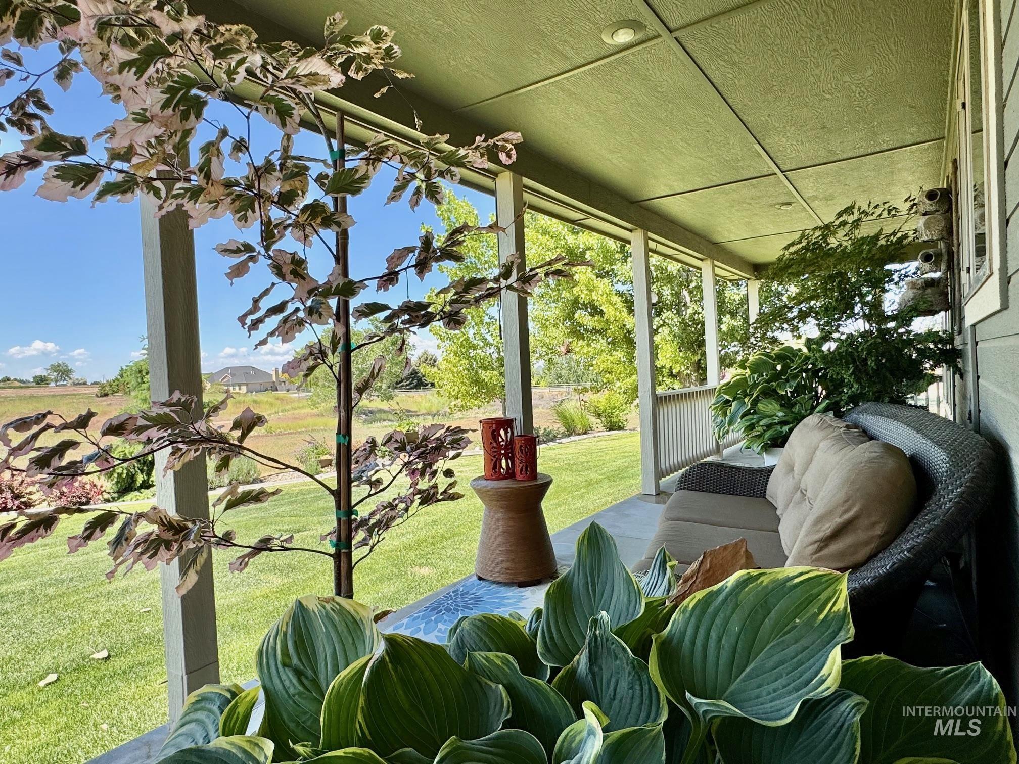 9299 Kemp Road Middleton, ID 83644 - Photo 41 of 50 Covered porch featuring a paneled ceiling with recessed lighting
