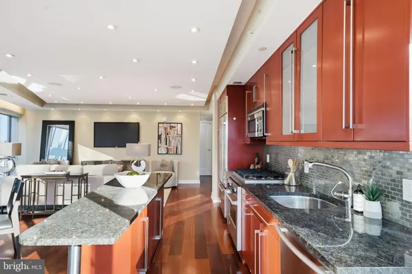 a kitchen with granite countertop lots of counter top space
