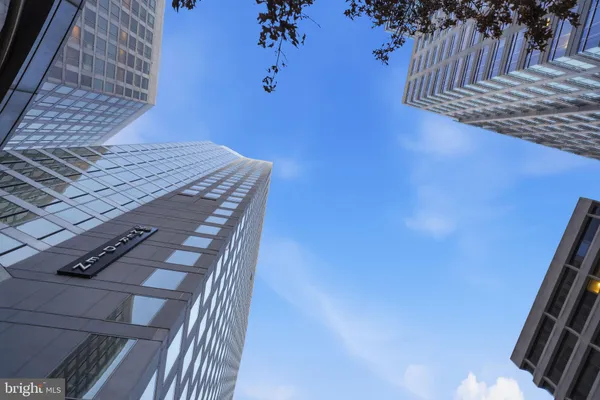 a view of parking with cars parked