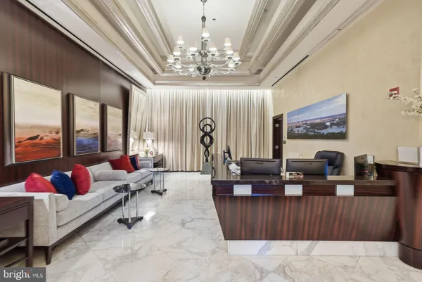 a view of a living room with furniture