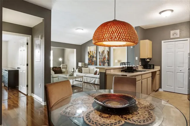 a kitchen with a white cabinets and appliances