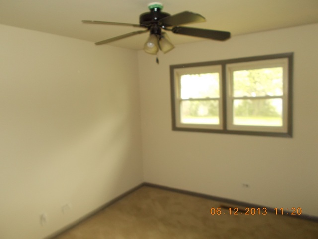 613 Stonegate Road New Lenox, IL 60451 - Photo 3 of 8 a view of a window in a room
