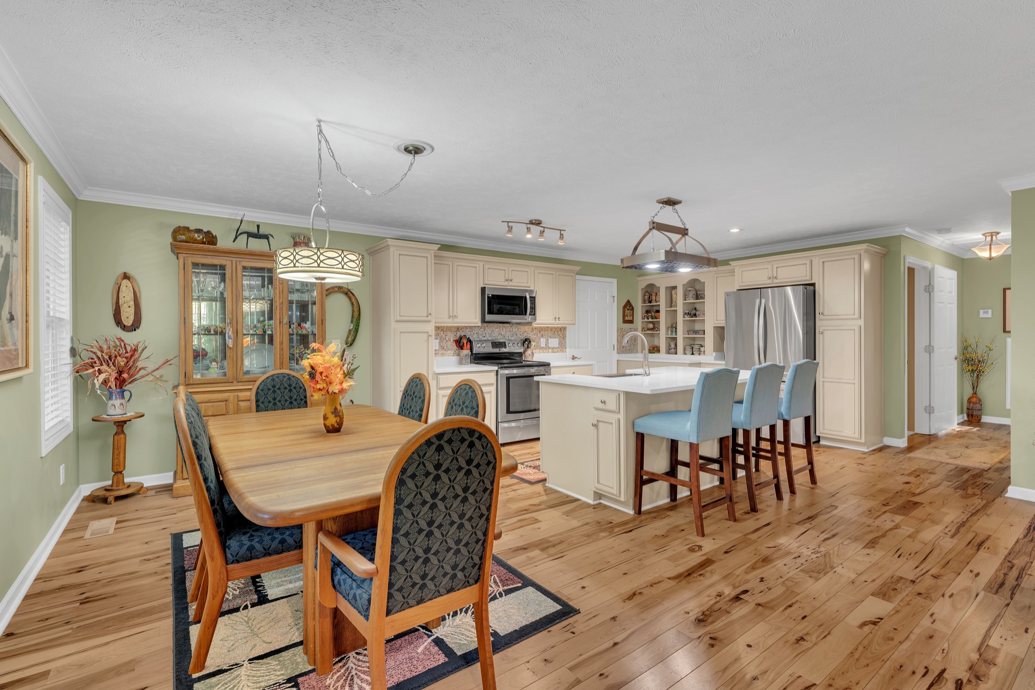 1475 Petty Road White Bluff, TN 37187 - Photo 12 of 55 a view of a dining room with furniture and wooden floor