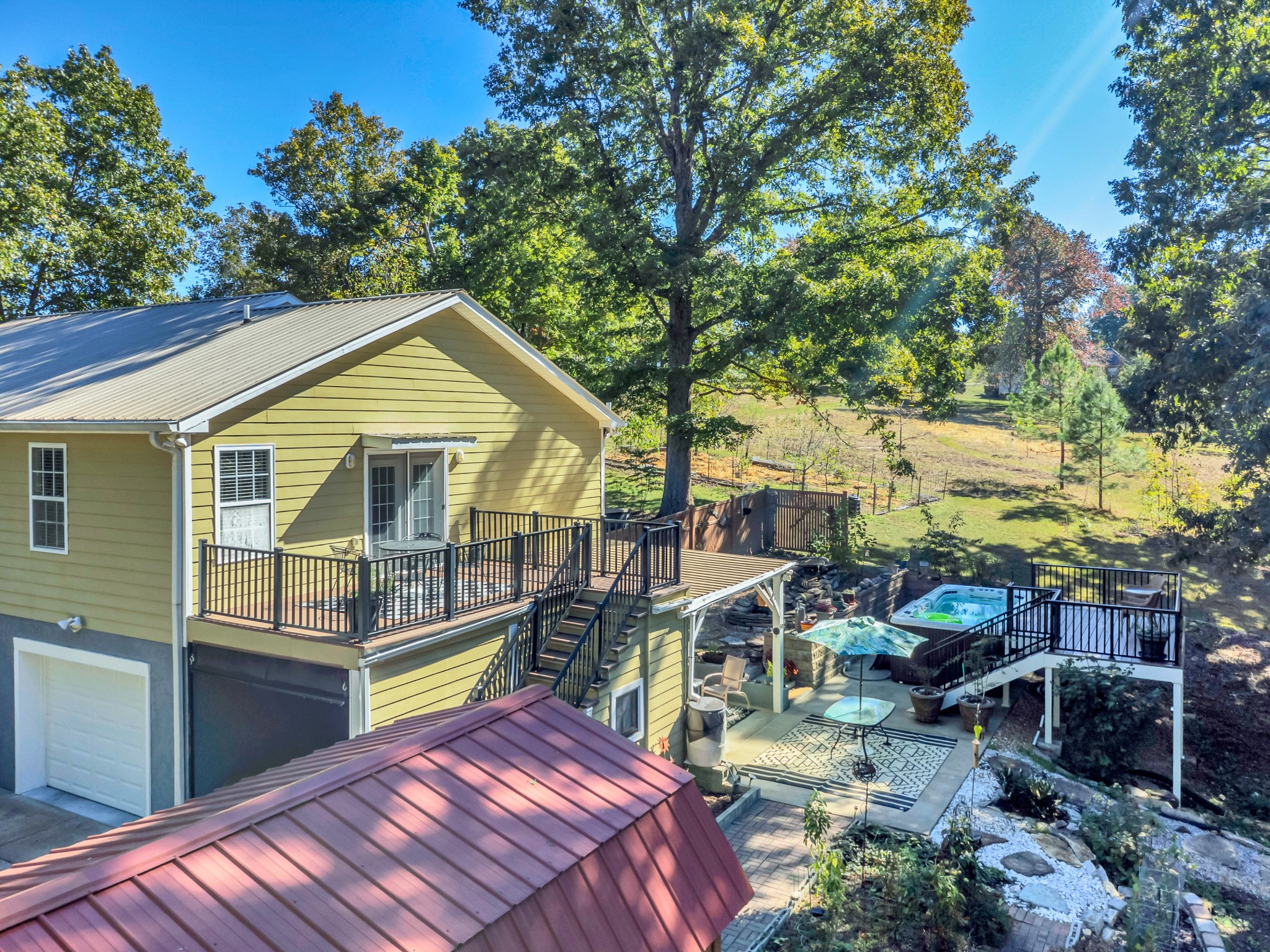 1475 Petty Road White Bluff, TN 37187 - Photo 2 of 55 a front view of a house with a garden