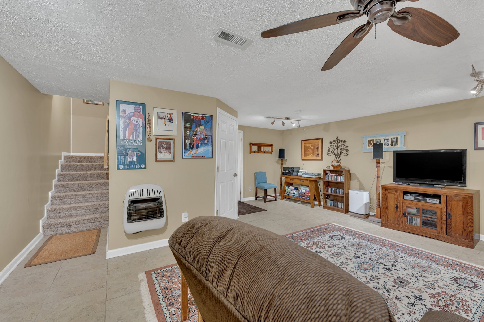 1475 Petty Road White Bluff, TN 37187 - Photo 27 of 55 a bedroom with furniture and a flat screen tv