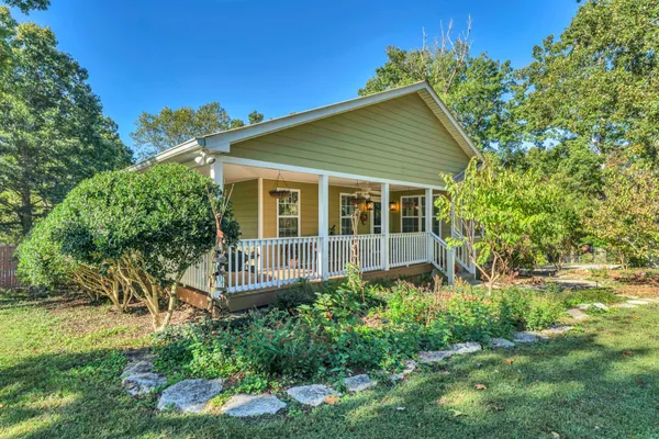 a house view with a garden space