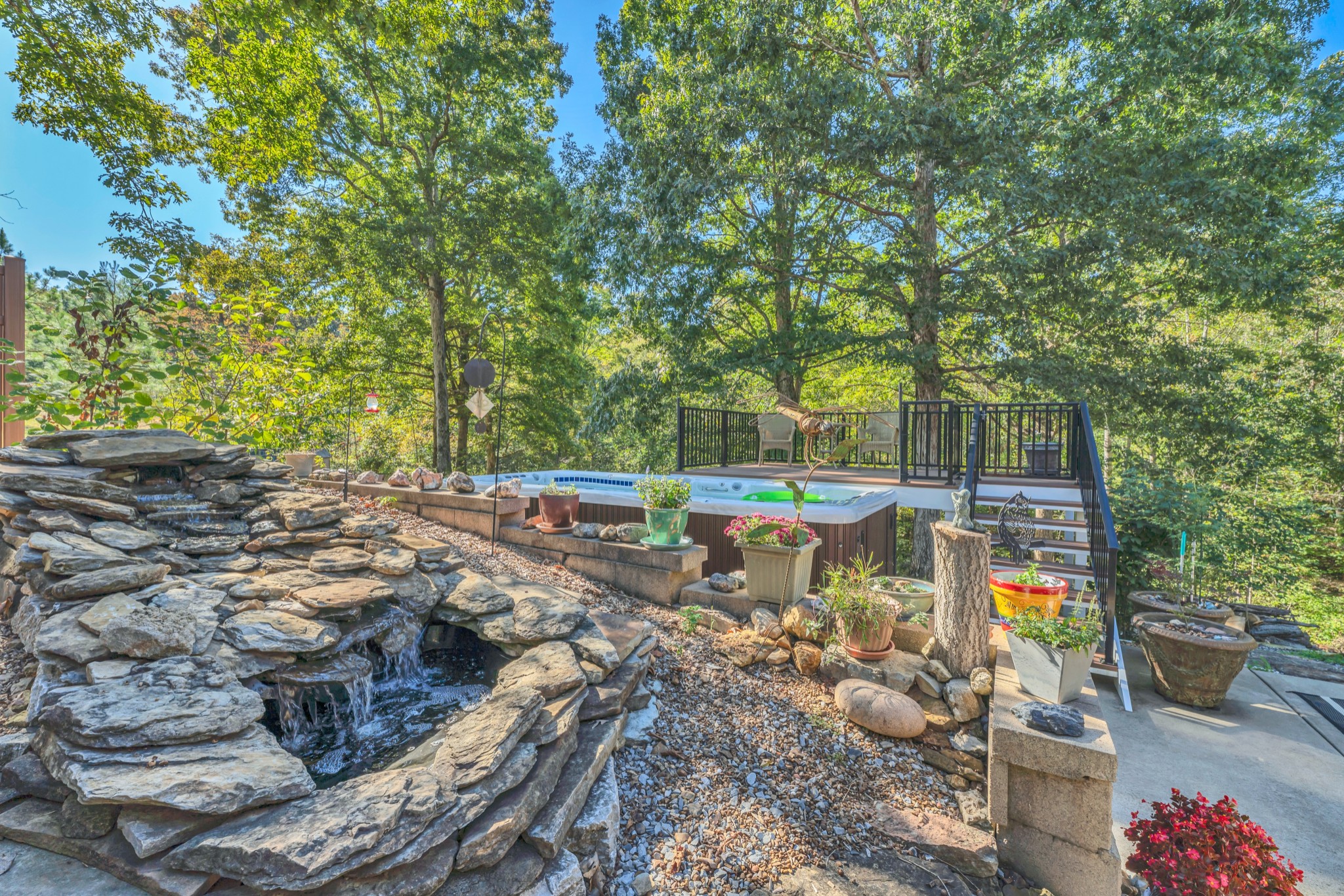 1475 Petty Road White Bluff, TN 37187 - Photo 32 of 55 a view of a yard with plants and a patio
