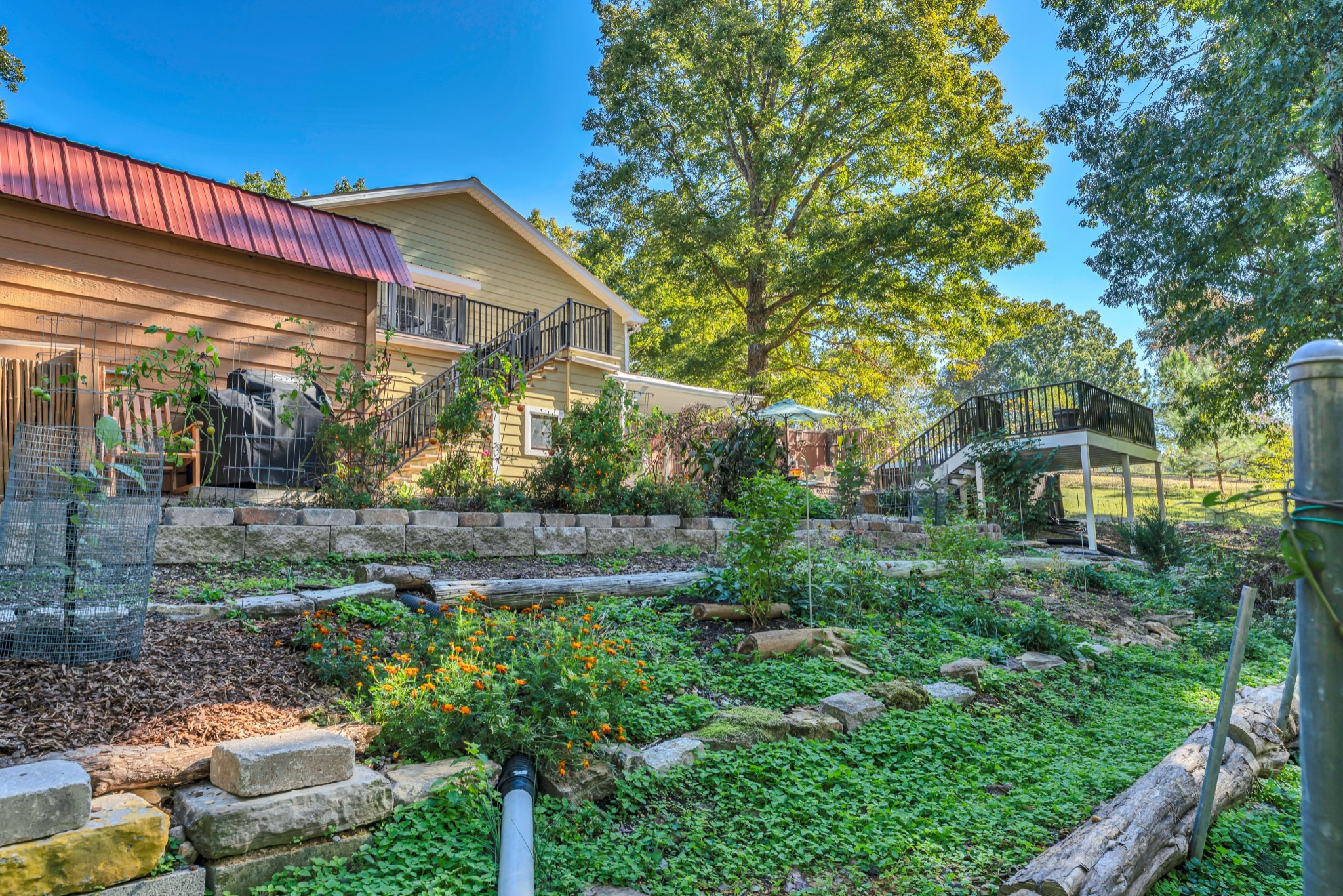 1475 Petty Road White Bluff, TN 37187 - Photo 36 of 55 a front view of a house with garden