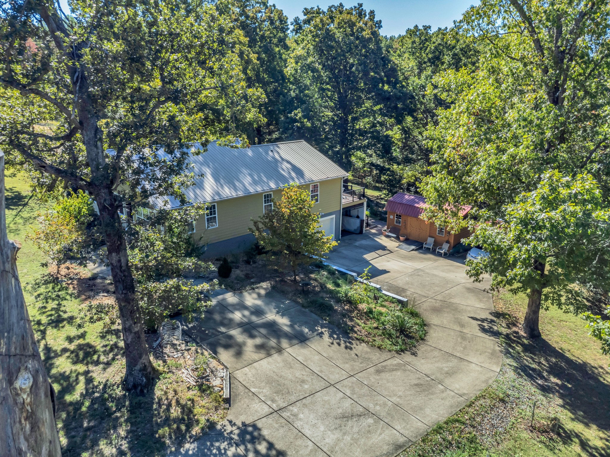 1475 Petty Road White Bluff, TN 37187 - Photo 40 of 55 a aerial view of a house with large trees