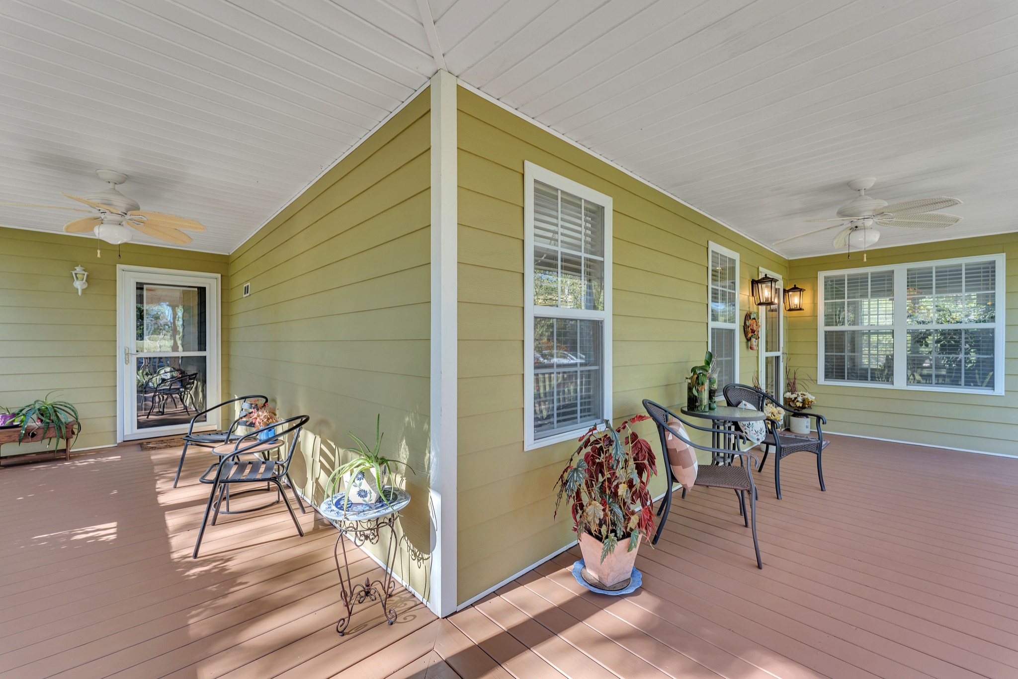 1475 Petty Road White Bluff, TN 37187 - Photo 4 of 55 a view of a patio with table and chairs and potted plants