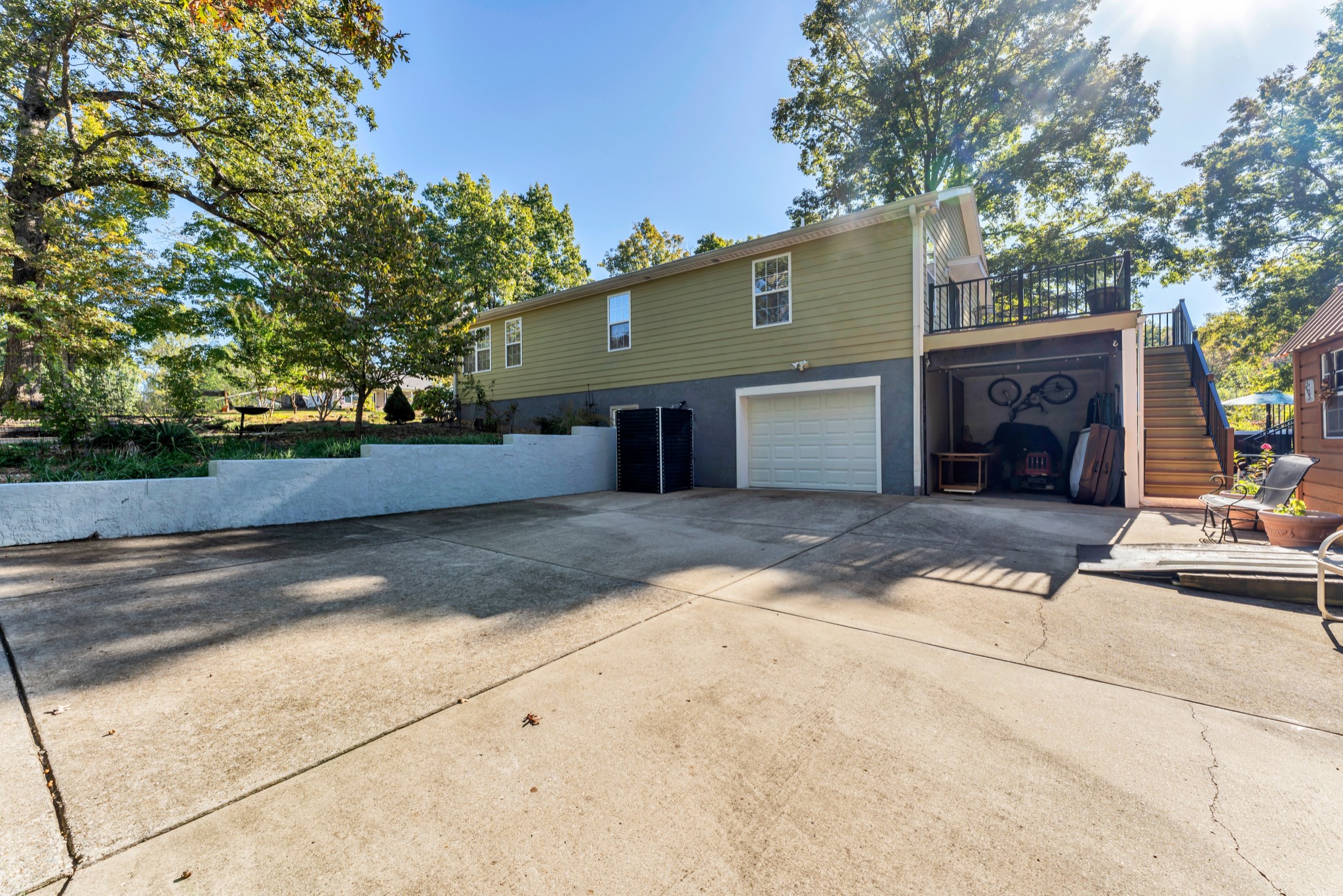 1475 Petty Road White Bluff, TN 37187 - Photo 42 of 55 a front view of a house with a yard and garage