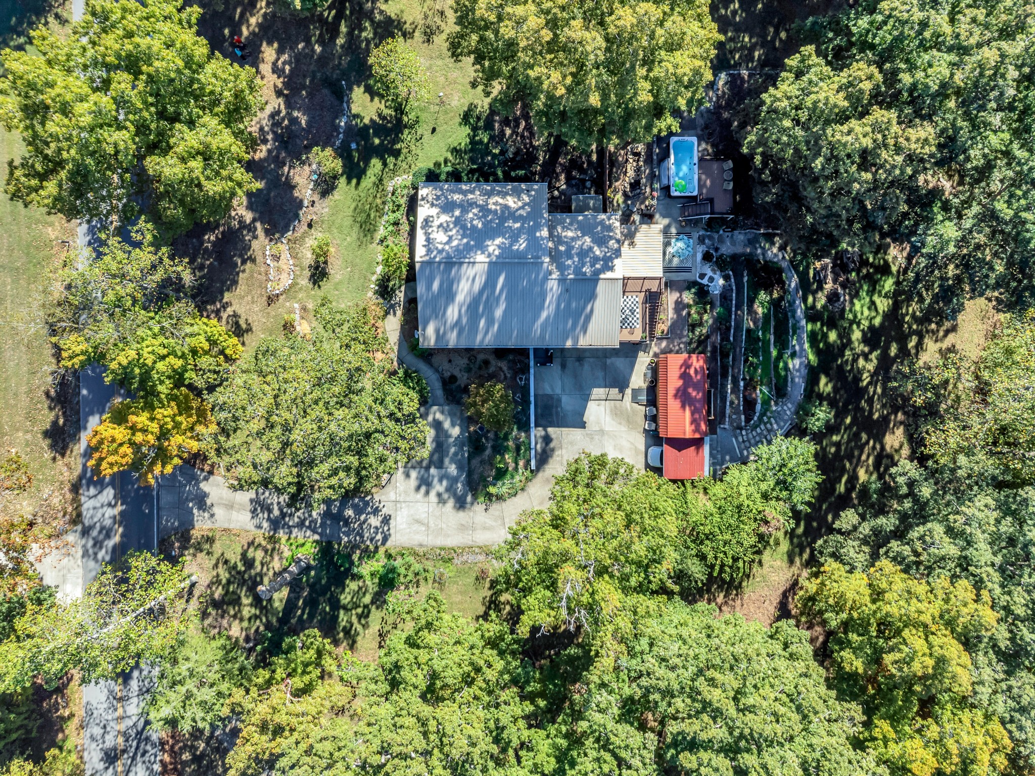 1475 Petty Road White Bluff, TN 37187 - Photo 52 of 55 an aerial view of a house with a yard and large trees