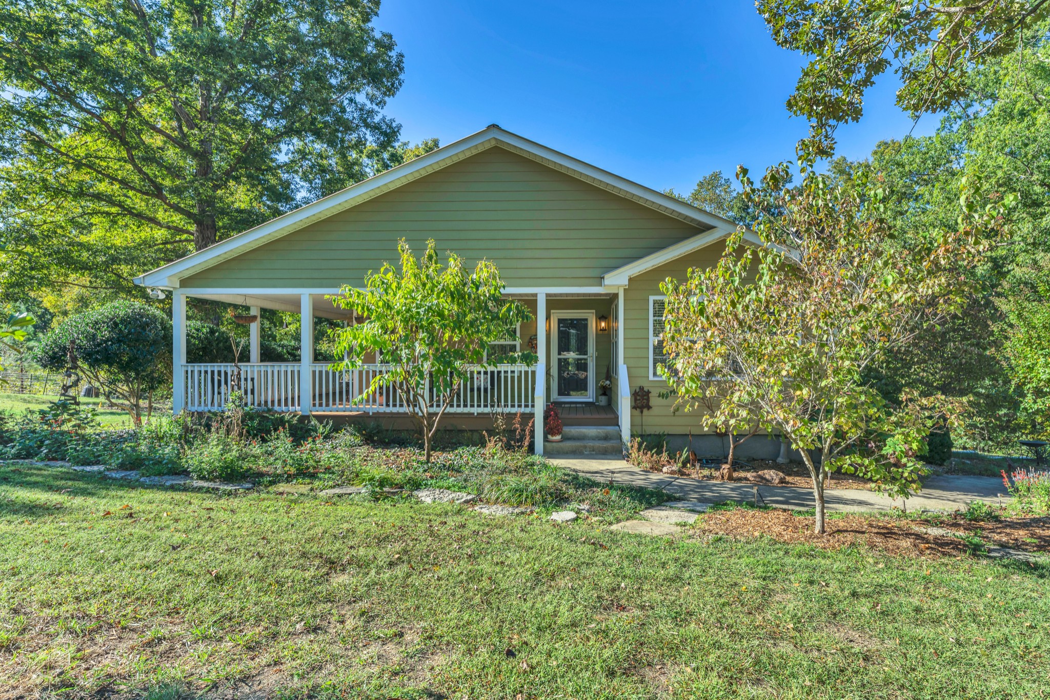 1475 Petty Road White Bluff, TN 37187 - Photo 55 of 55 a house with green field in front of it