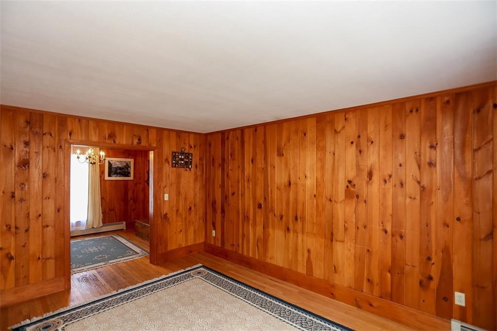 960 Ridge Road Bowdoinham, ME 04008 - Photo 10 of 30 Living room area leading into a...