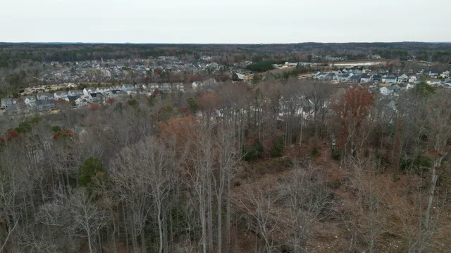 a view of lake with green space