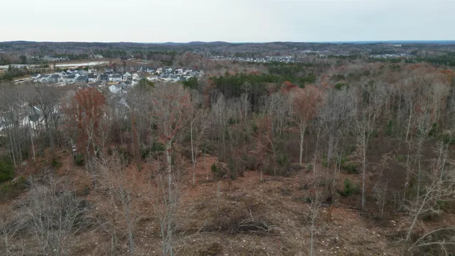 a view of a backyard of the house