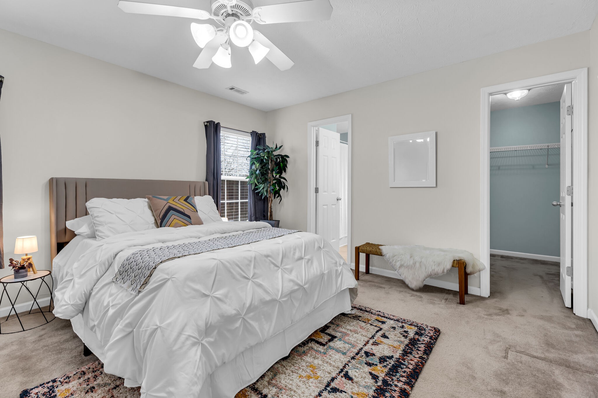 4026 Deer Run Trace Spring Hill, TN 37174 - Photo 16 of 29 a bedroom with a bed and ceiling fan