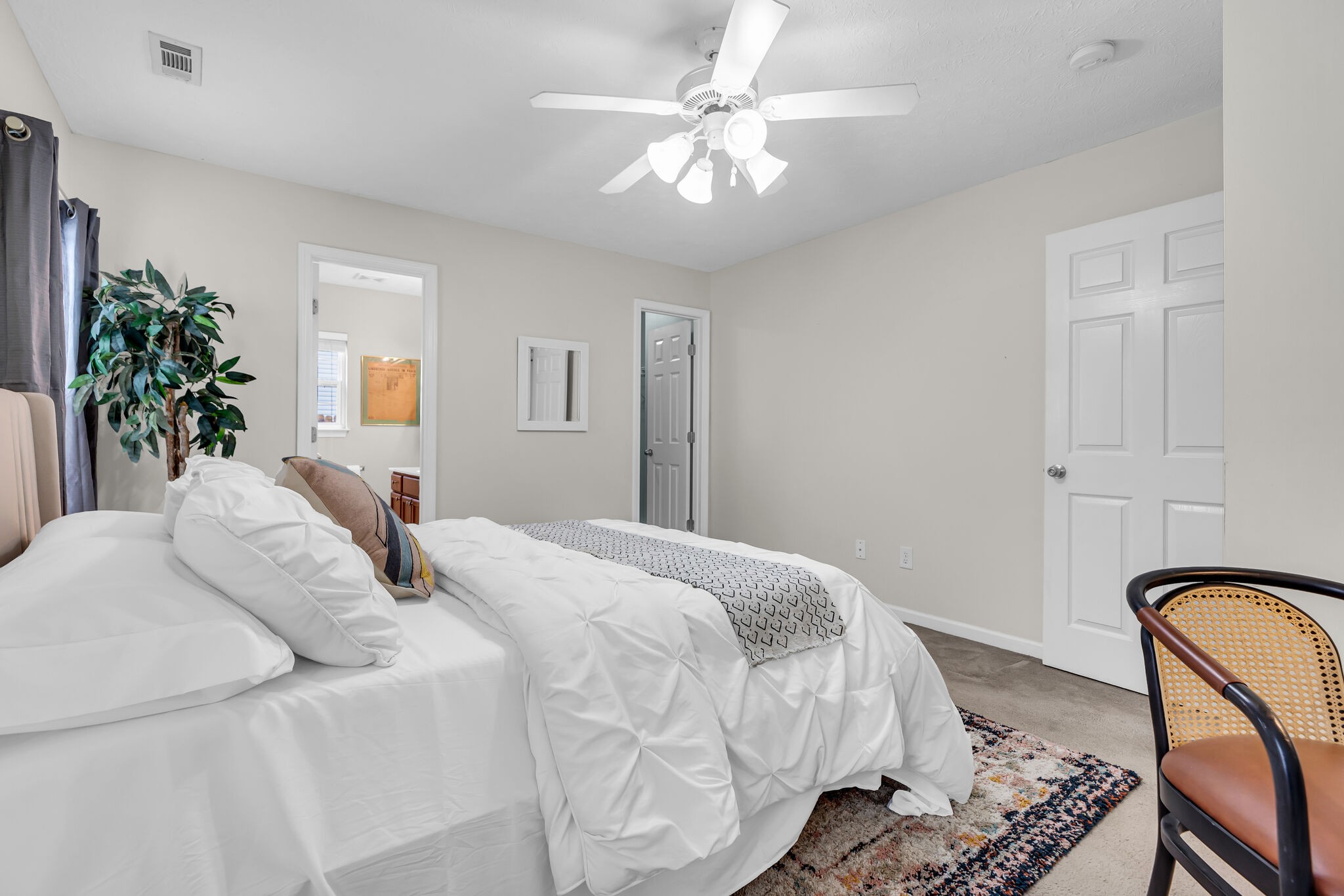 4026 Deer Run Trace Spring Hill, TN 37174 - Photo 18 of 29 a spacious bedroom with a bed and ceiling fan