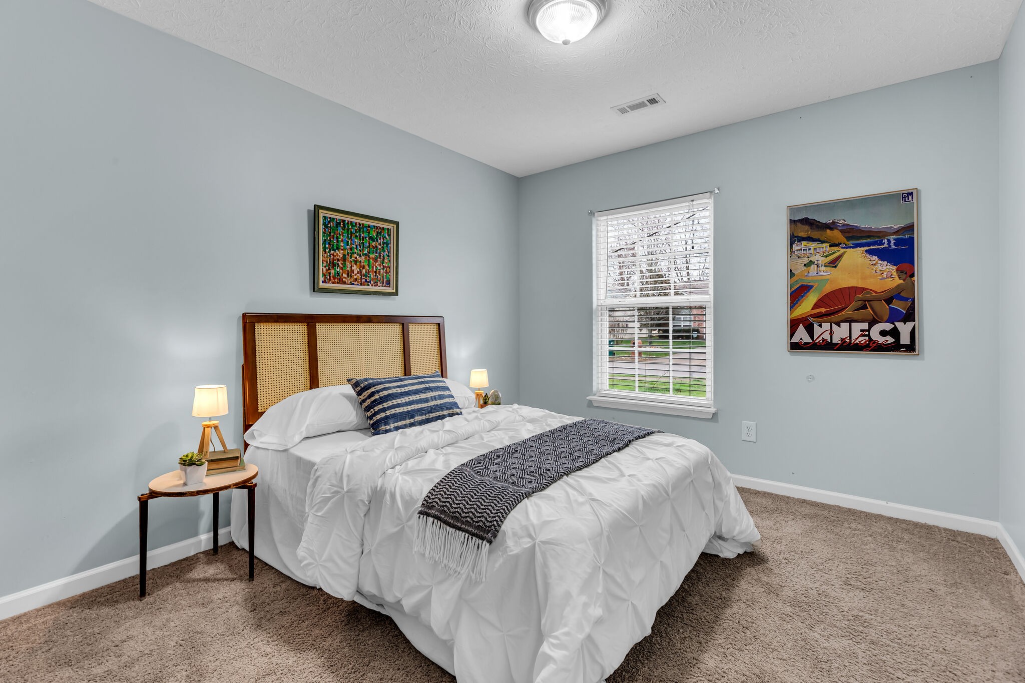 4026 Deer Run Trace Spring Hill, TN 37174 - Photo 21 of 29 a bedroom with bed and painting on the wall