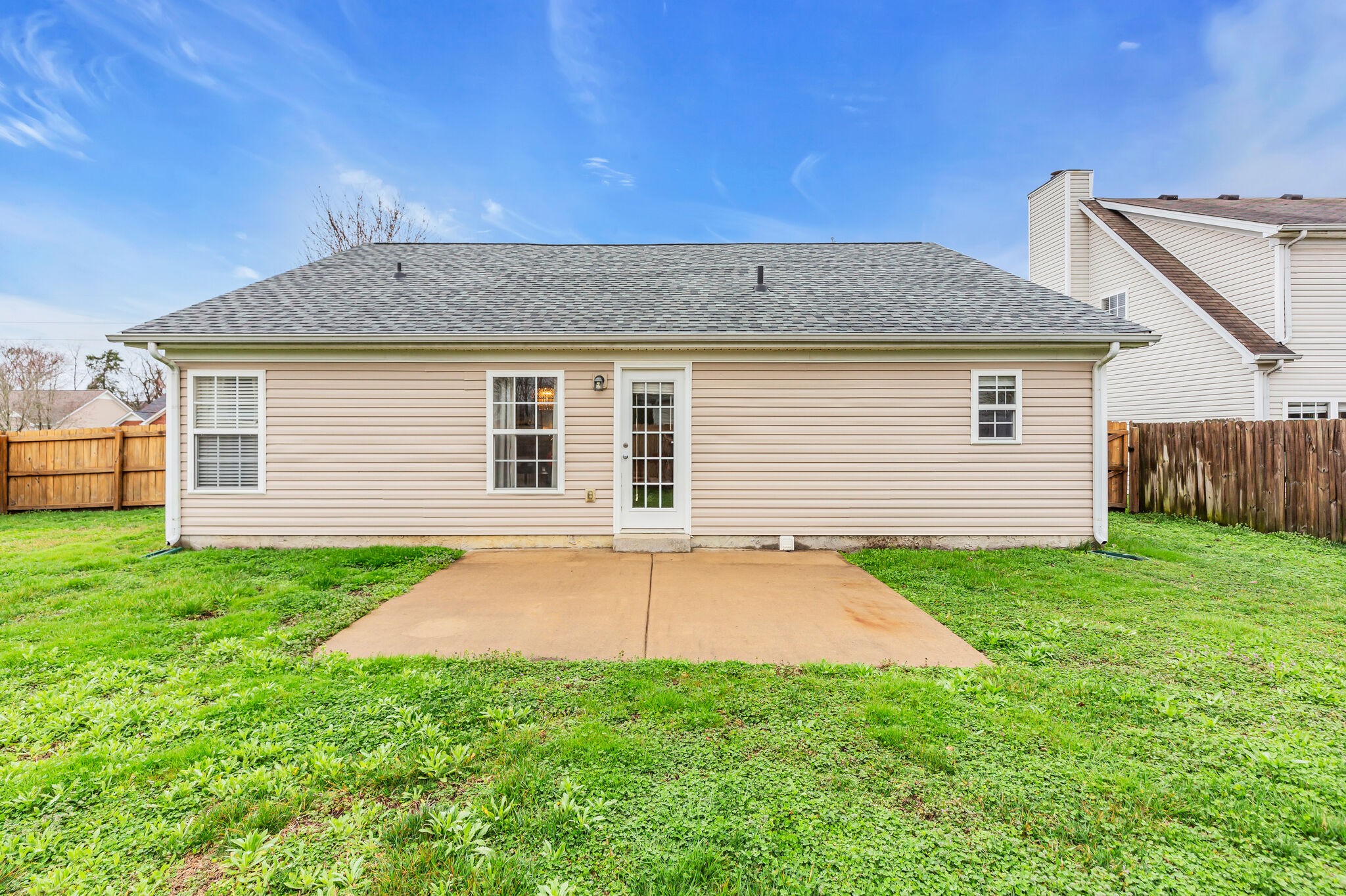 4026 Deer Run Trace Spring Hill, TN 37174 - Photo 26 of 29 a backyard of a house with lots of green space