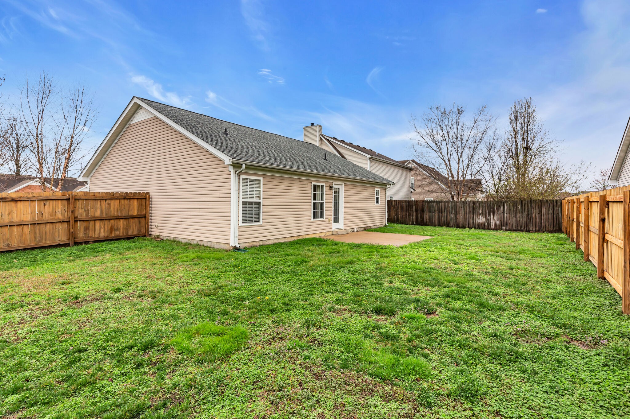 4026 Deer Run Trace Spring Hill, TN 37174 - Photo 29 of 29 a view of a backyard with a garden