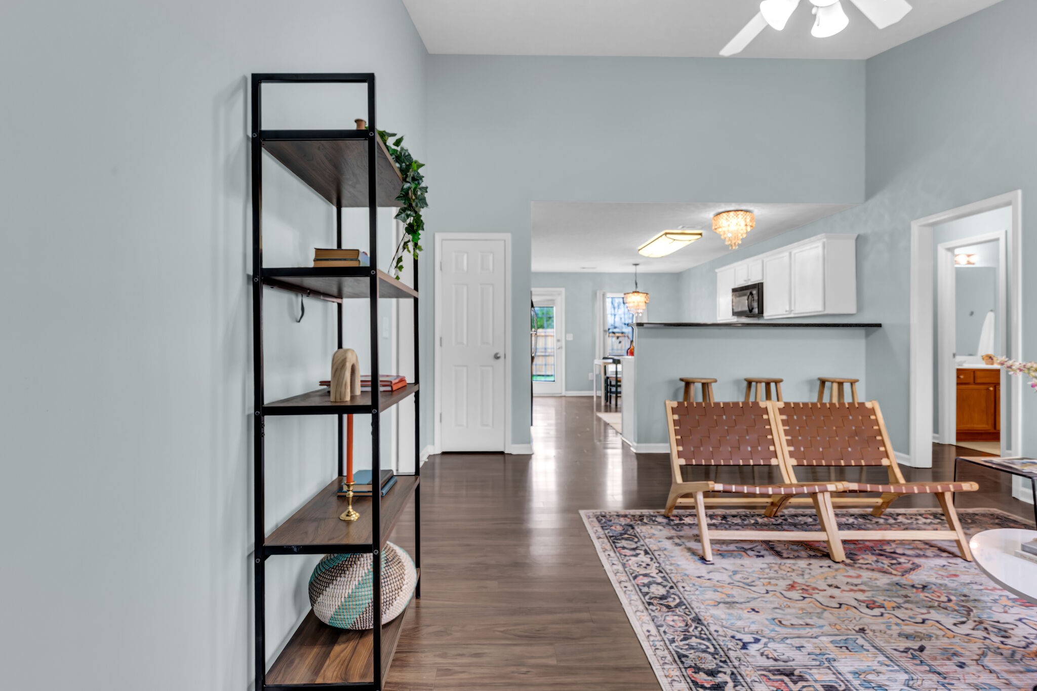 4026 Deer Run Trace Spring Hill, TN 37174 - Photo 4 of 29 a living room with furniture a flat screen tv and kitchen view