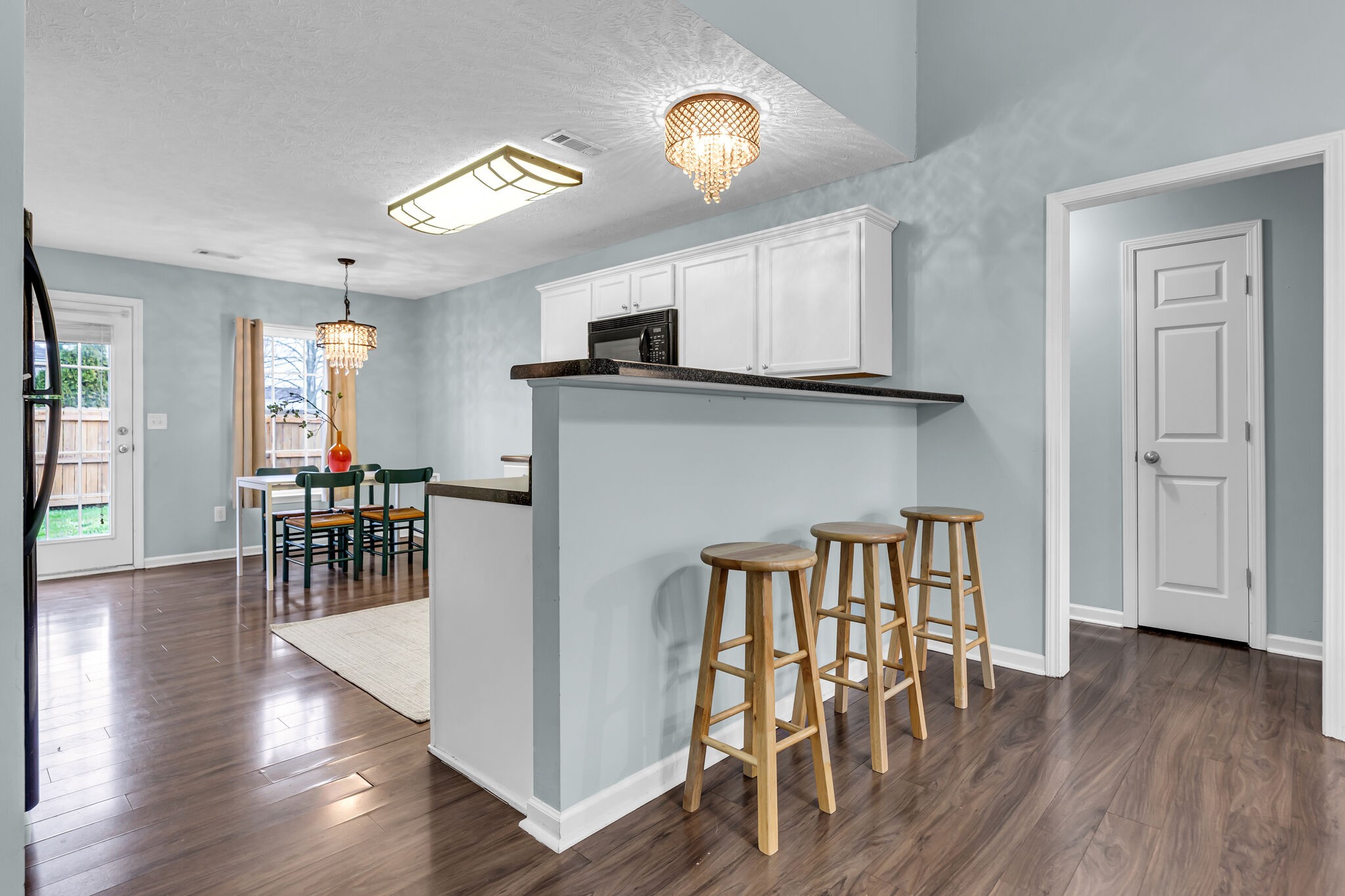 4026 Deer Run Trace Spring Hill, TN 37174 - Photo 9 of 29 a view of a livingroom with furniture and a kitchen view