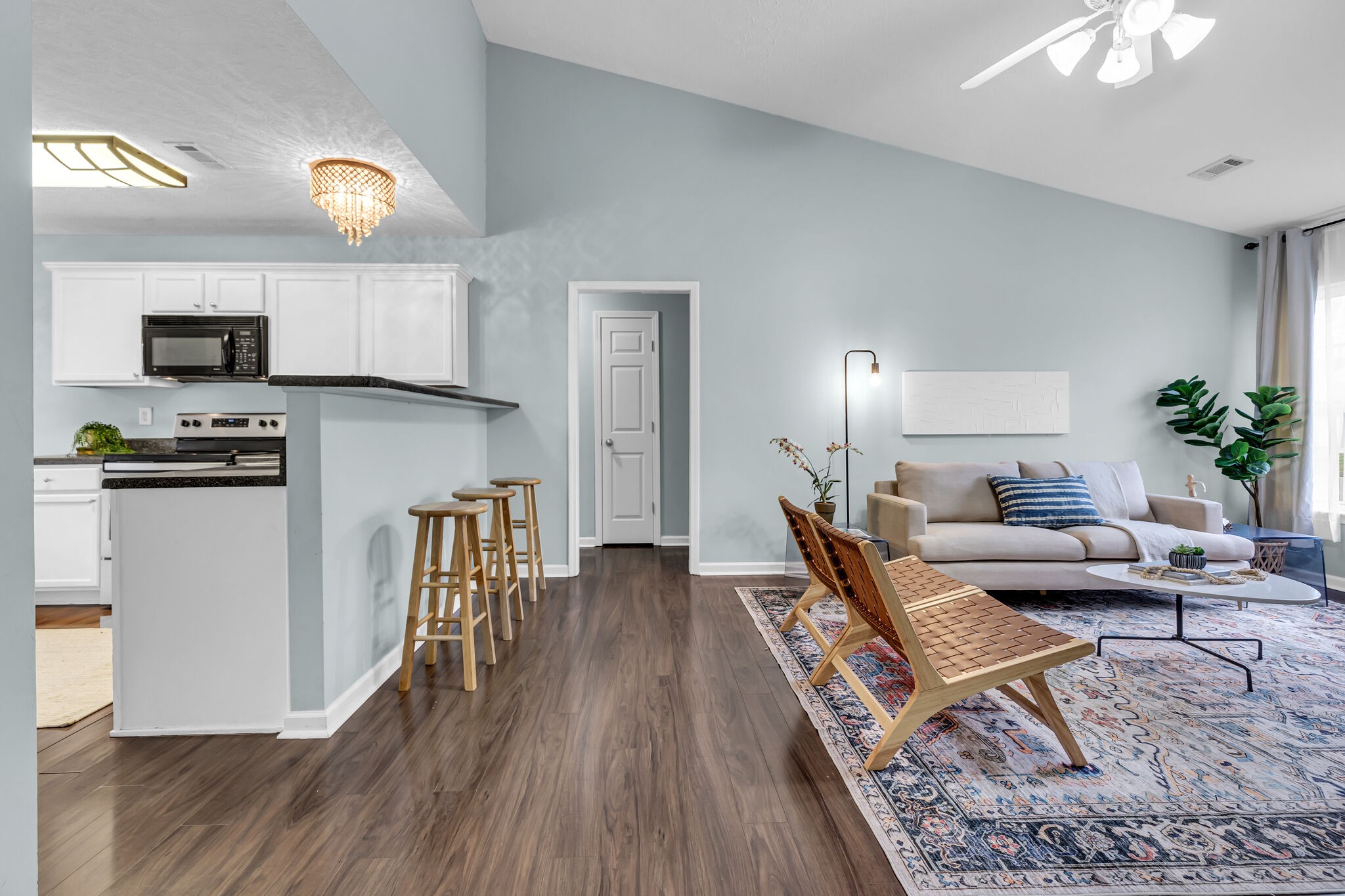 4026 Deer Run Trace Spring Hill, TN 37174 - Photo 10 of 29 a living room with furniture a flat screen tv and a table