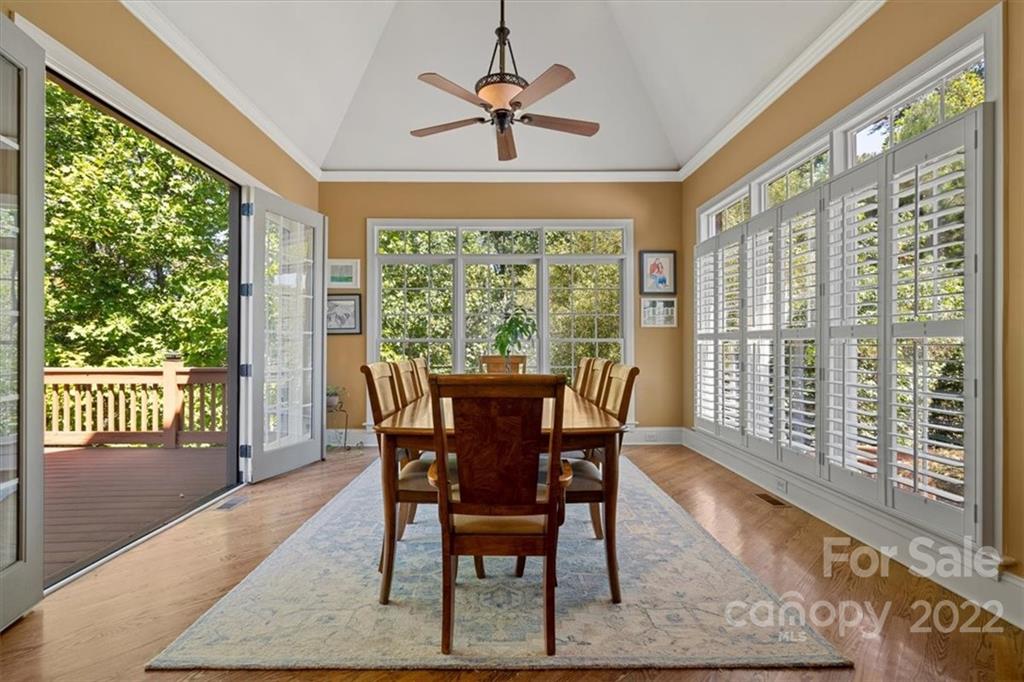 5766 Natoma Road Clover, SC 29710 - Photo 18 of 48 a dining room with furniture window and wooden floor
