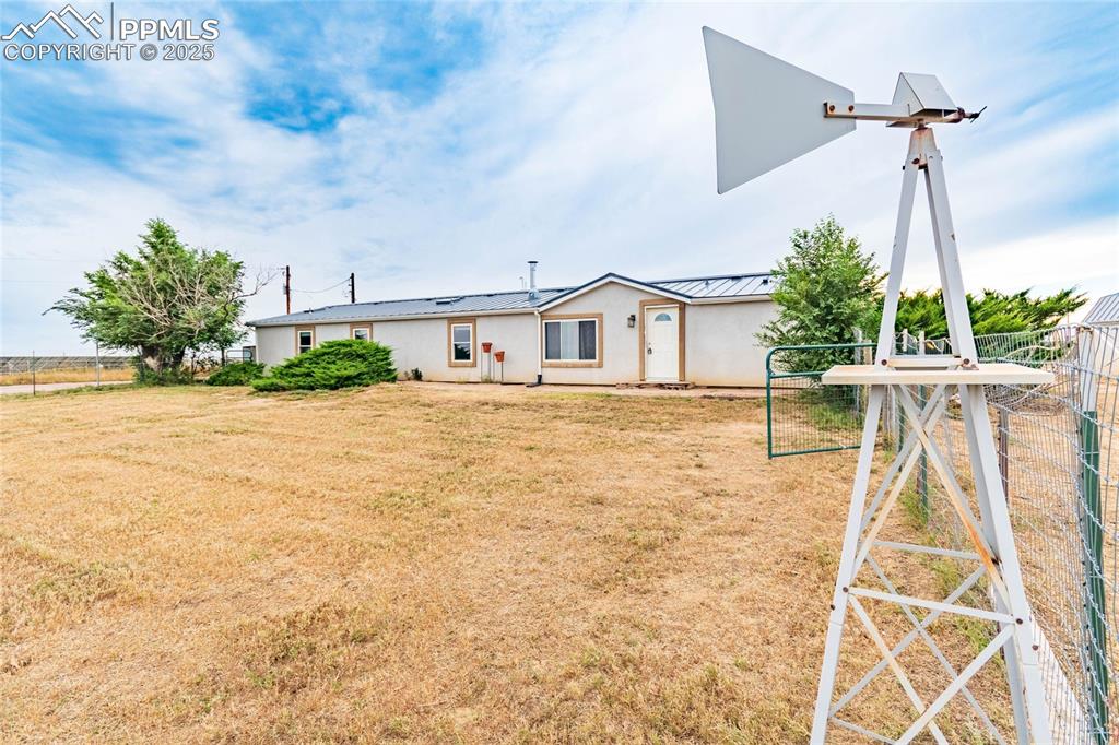 a house view with a garden space