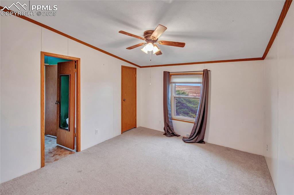 7940 Edison Road Yoder, CO 80864 - Photo 17 of 38 a view of an empty room with a window