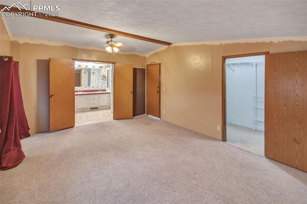 7940 Edison Road Yoder, CO 80864 - Photo 24 of 38 a view of a hallway with an empty room